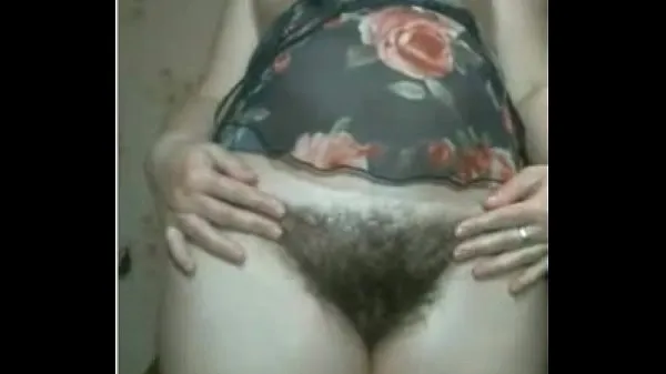 Tonton mega Tube Plays With Her Hairy Pussy