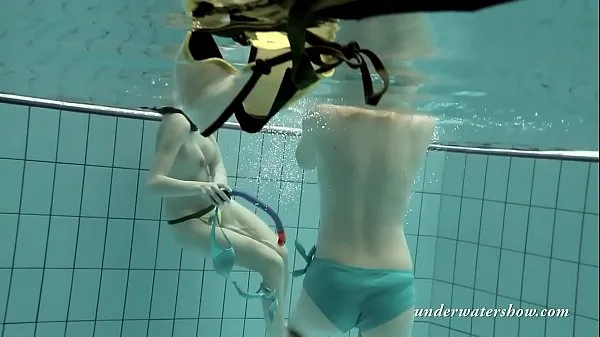Watch Girls swimming underwater and enjoying eachother mega Tube